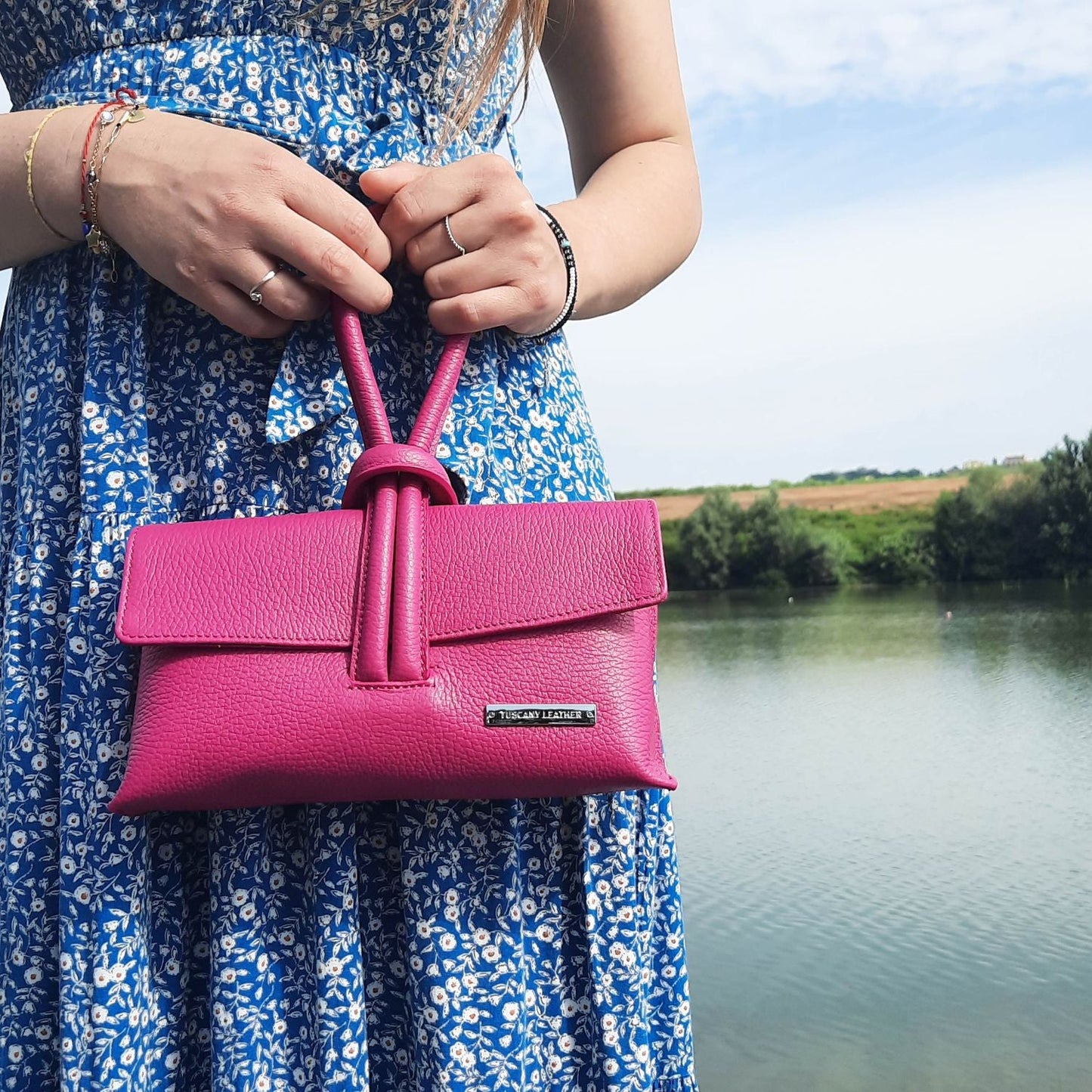 Tuscany Leather Clutch Bag with Detachable Shoulder Strap